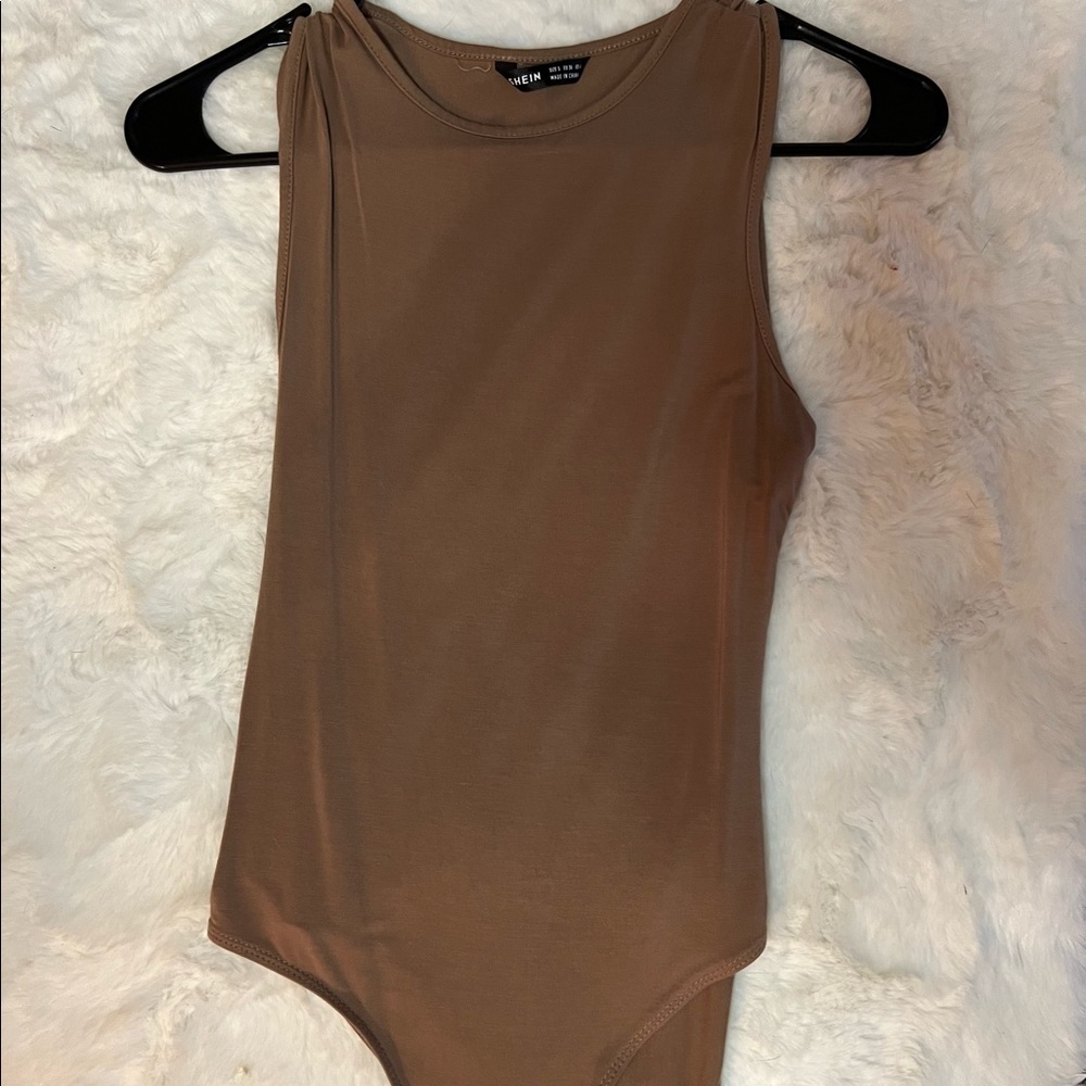 Never worn body suit